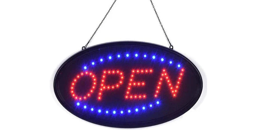 Oval LED open sign with red letters and blue border hanging by chain for business promotion