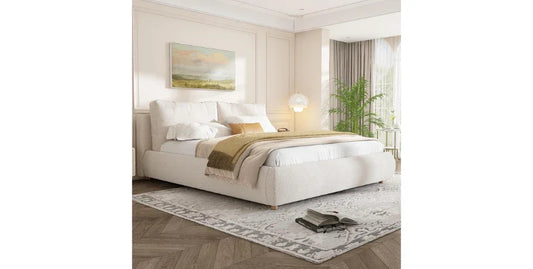 Merax queen size boucle fabric upholstered platform bed in beige bedroom with rug and wall art
