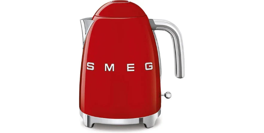 Red SMEG retro electric kettle with chrome handle and base on white background