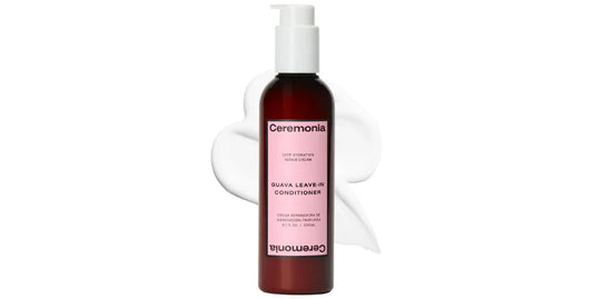 Ceremonia Guava Leave-In Conditioner bottle with pump and white cream smear for deep hydration and repair
