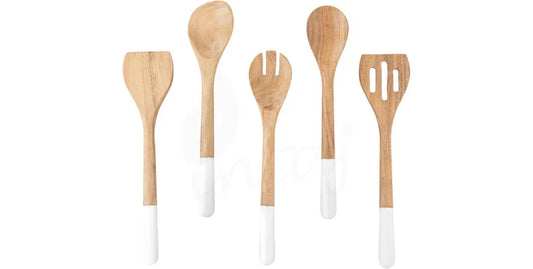 Set of five wooden kitchen utensils with white handles on white background