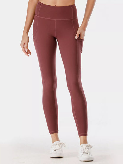 Full Size High-Waisted Active Leggings with Pockets Plus Size Rust