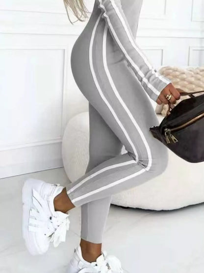 Full Size Stripe Zip-Front Long Sleeve Jumpsuit Plus Size